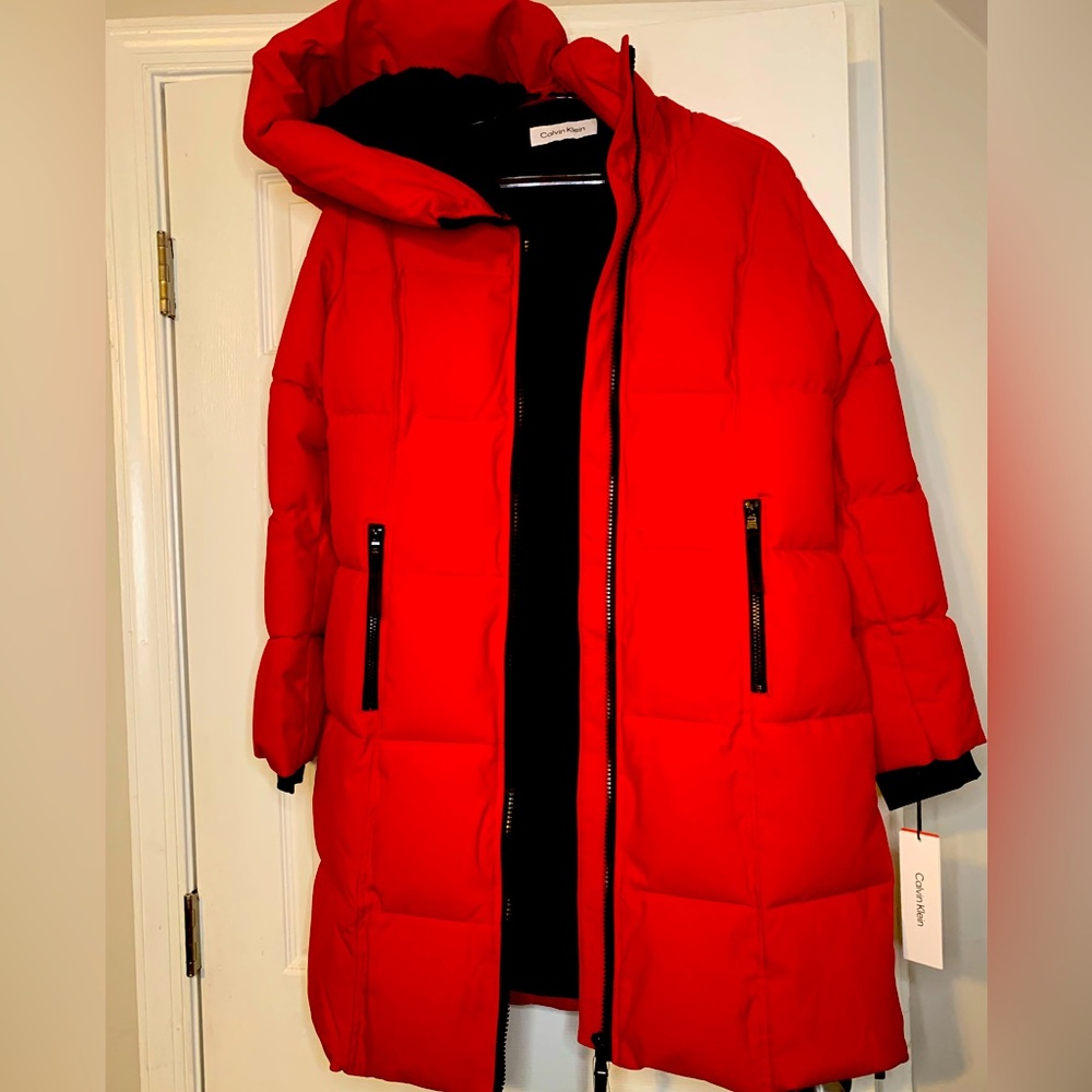 Red puffer coat